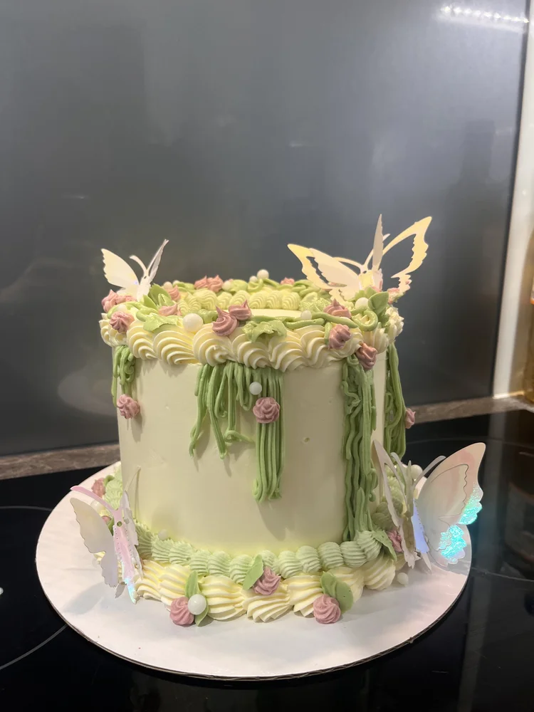 Pastel cake with butterfly decorations