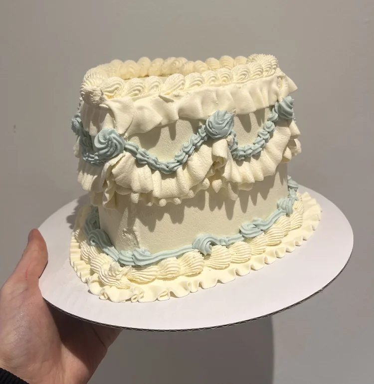 Pastel watercolor cake with floral decorations